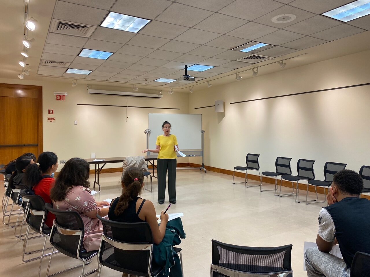 ellen-karcinell-teaches-student-at-hewlett-woodmere-public-library-how